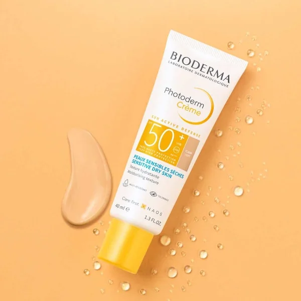 PHOTODERM - Crème Solaire Teintée Claire SPF50+ - Visage - Peaux Sensibles Sèches, 40ml