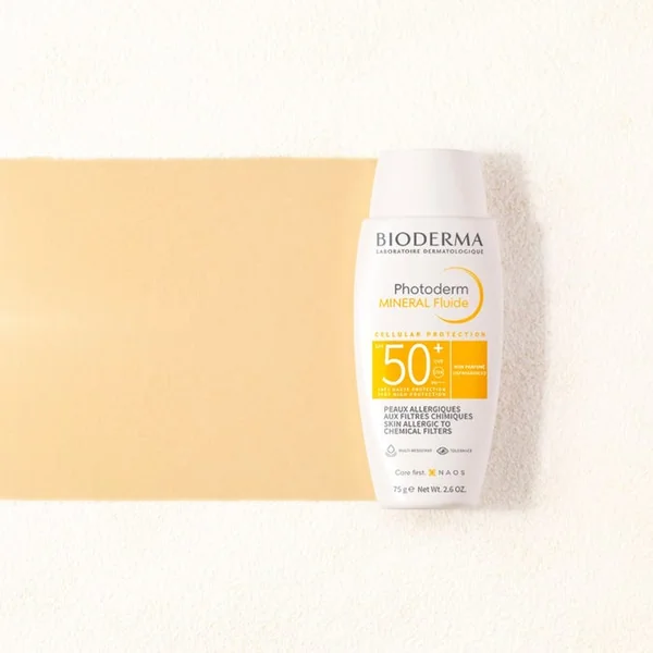 PHOTODERM MINERAL - Fluide Solaire Sans Parfum SPF50+ - Visage et Corps - Peaux Allergiques aux Filtres Chimiques, 75g