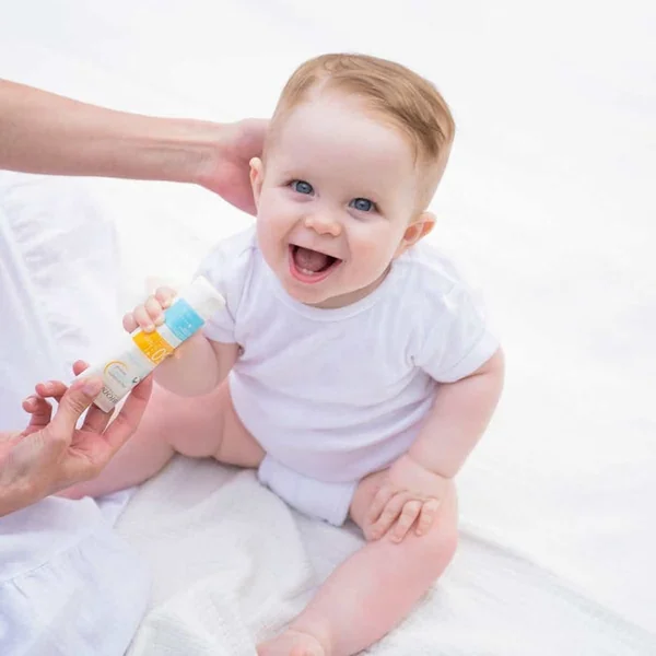 PHOTODERM PEDIATRICS - Fluide Solaire Minéral SPF50+ - Visage et Corps - Peaux Sensibles des Bébés, 50g